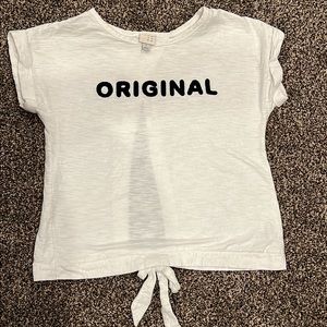 A New Day | Size Small | White open back tee with ORIGINAL on front